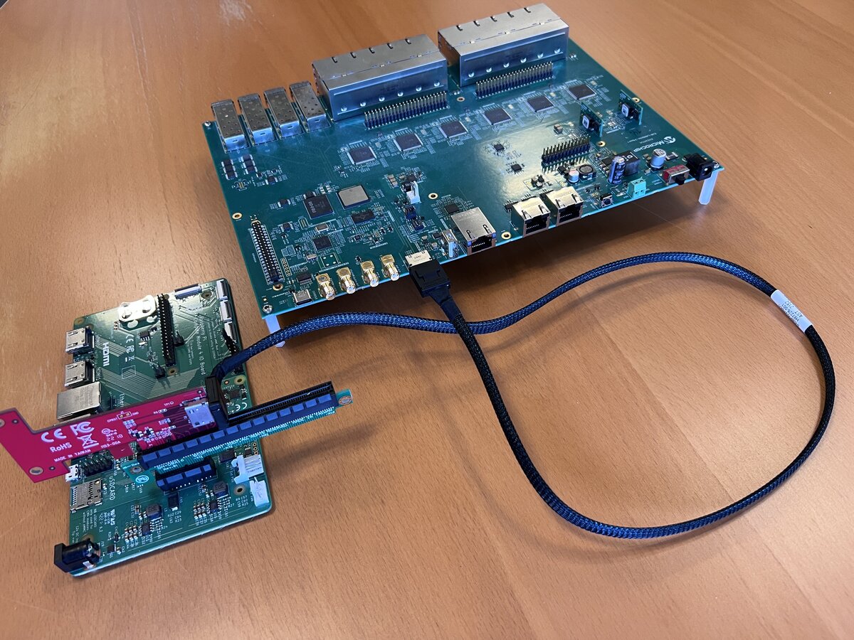 Raspberry PI Compute Module IO Board connected to the LAN969x EVB via an Oculink cable